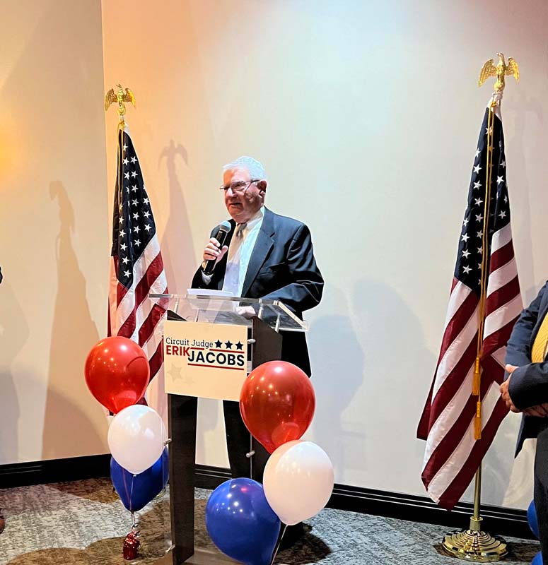 Speaking at podium